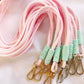 paracord lanyard in pastel pink and mint