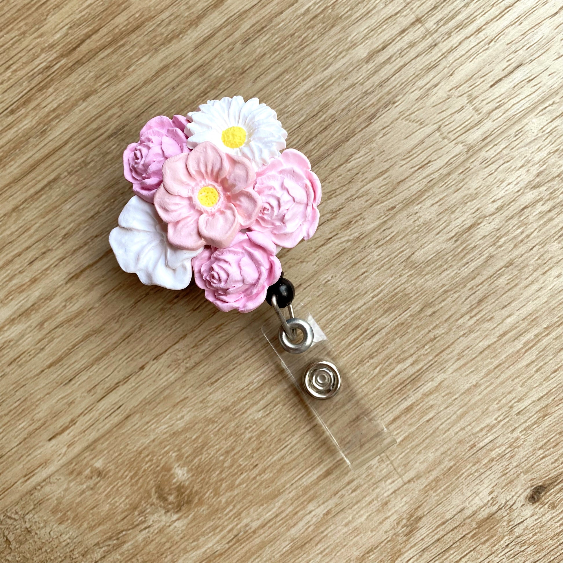 floral retractable badge reel, made with polymer clay in beautiful pink and white