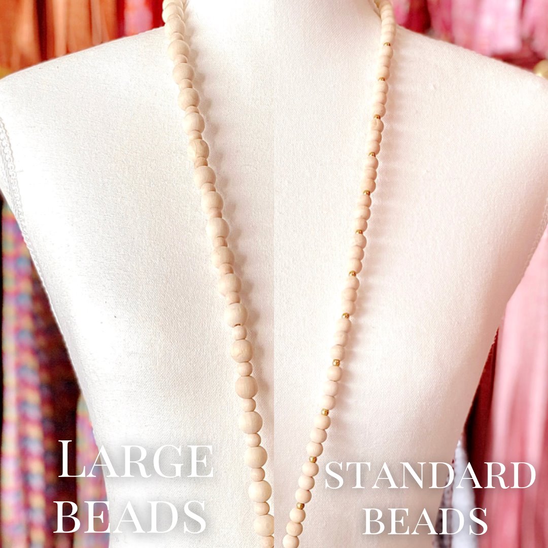 large beads vs small beads on display