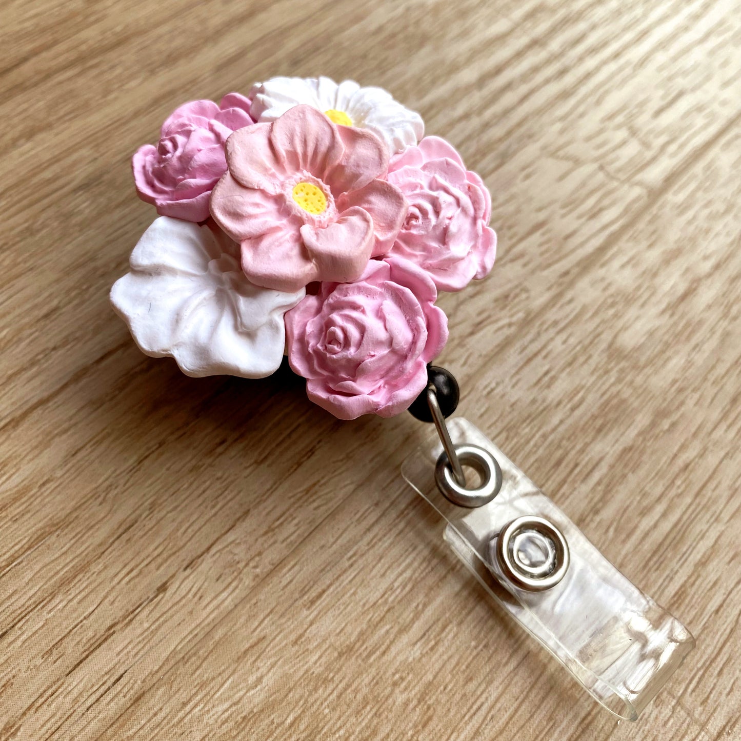 bouquet of flowers, handmade with polymer clay, retractable badge reel