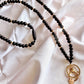 black and gold wooden beaded lanyard with gold plated lanyard clasp