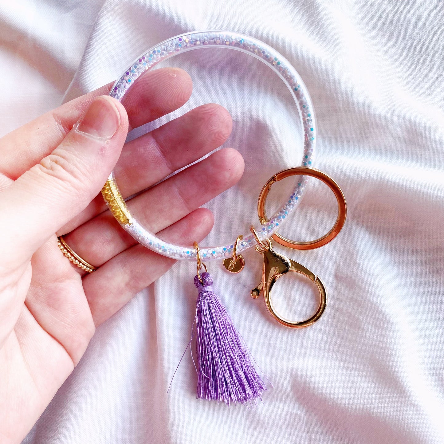 holographic white glitter and purple tassel, jelly bangle bangle and keychain