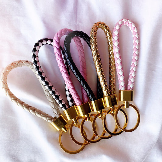 braided faux leather keychain in multiple colours with gold hardware