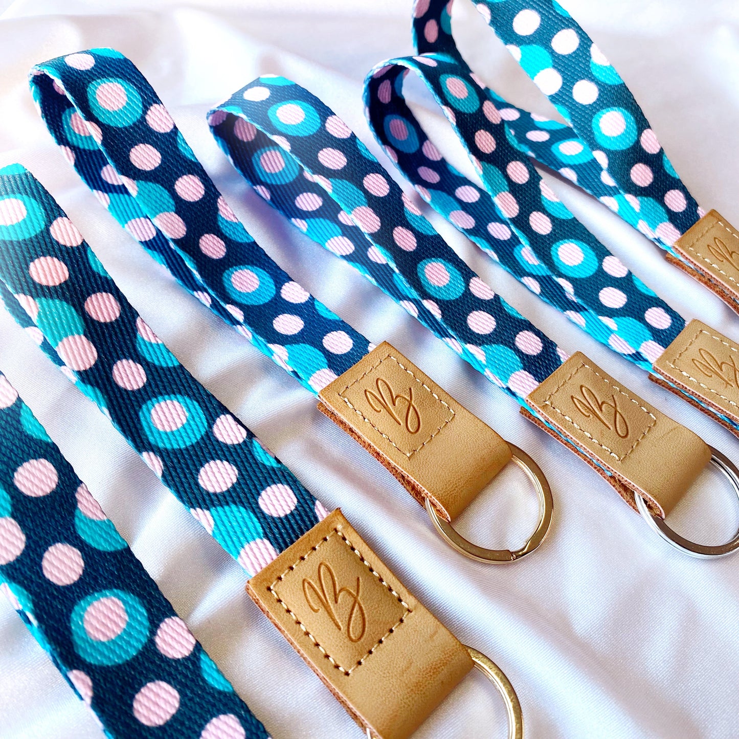 fabric keychain with navy blue and pink polka-dots