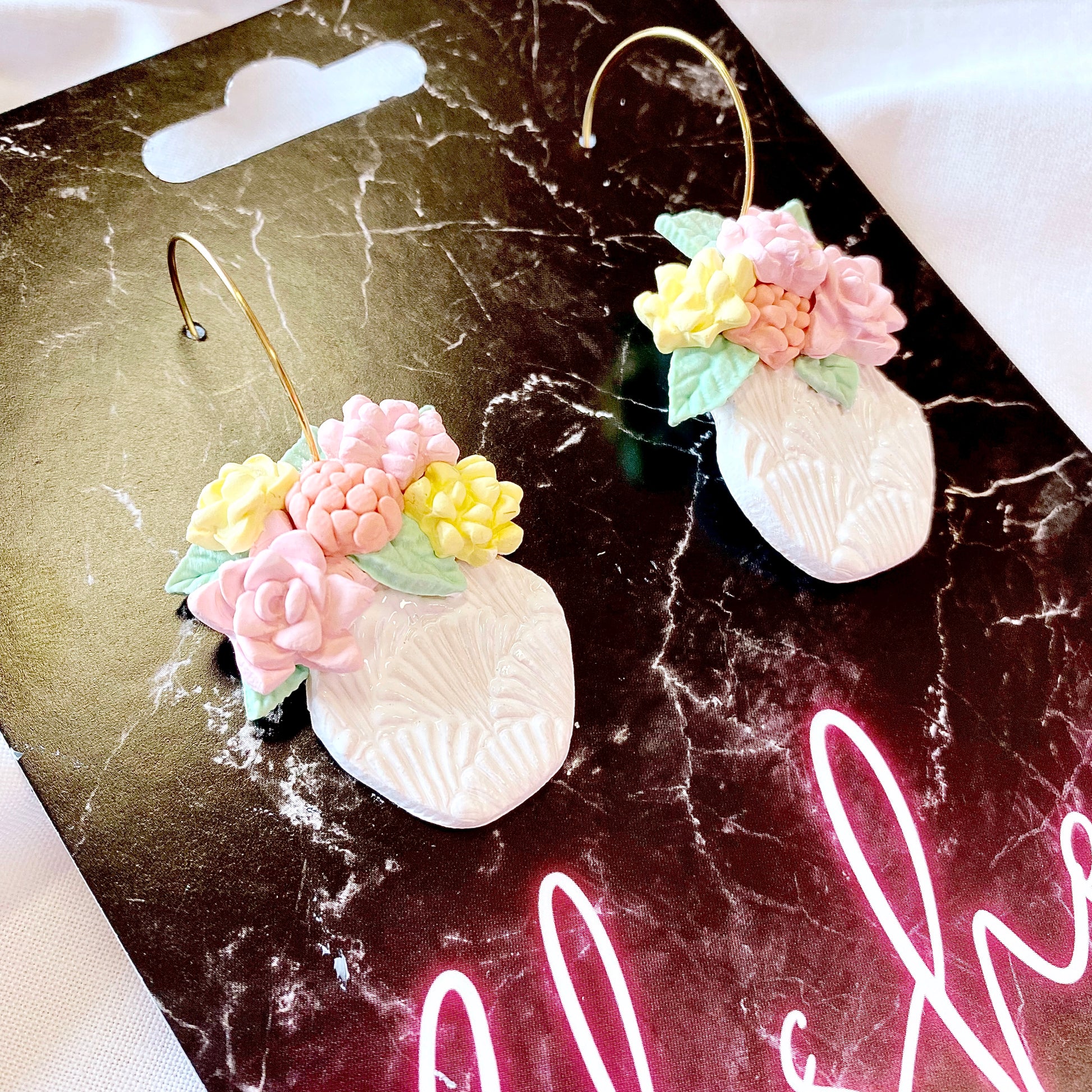 handmade polymer clay hoop earrings with pastel florals