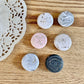 Handmade polymer clay fridge magnets in natural stone look