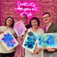 a group of Brisbane alcohol ink workshop attendees showing their finished art