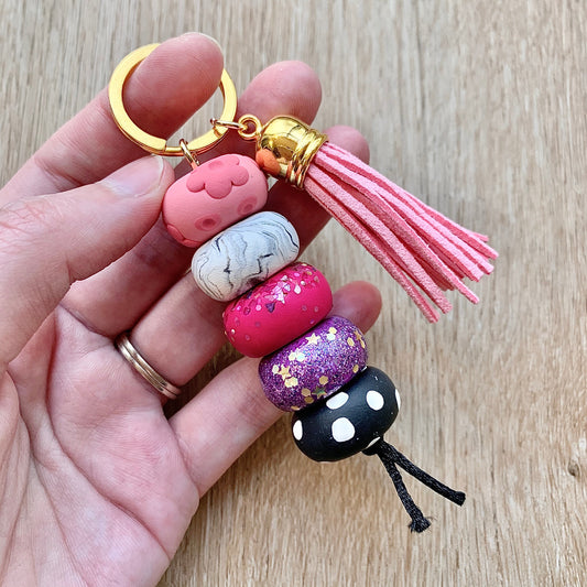 polymer clay beaded keychain in pink and purple