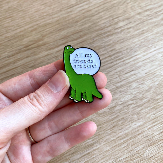 sad lonely dinosaur enamel brooch lapel pin