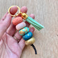 polymer clay beaded keychain with teal, mint and peach beads