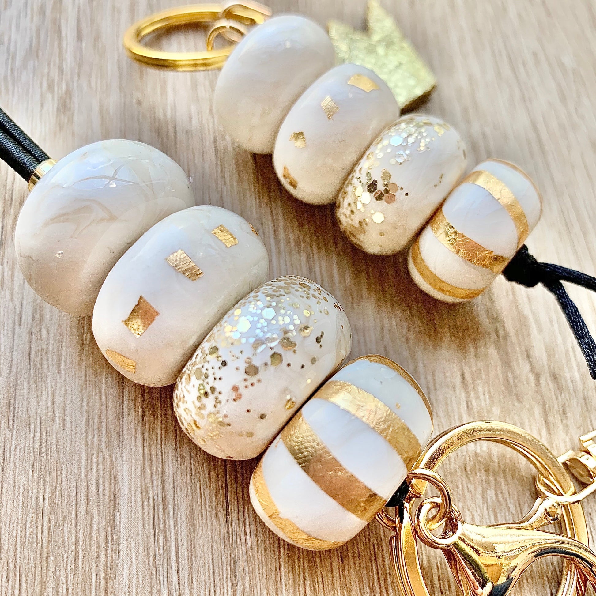 shiny cream and gold polymer clay beads with gold glitter and foil