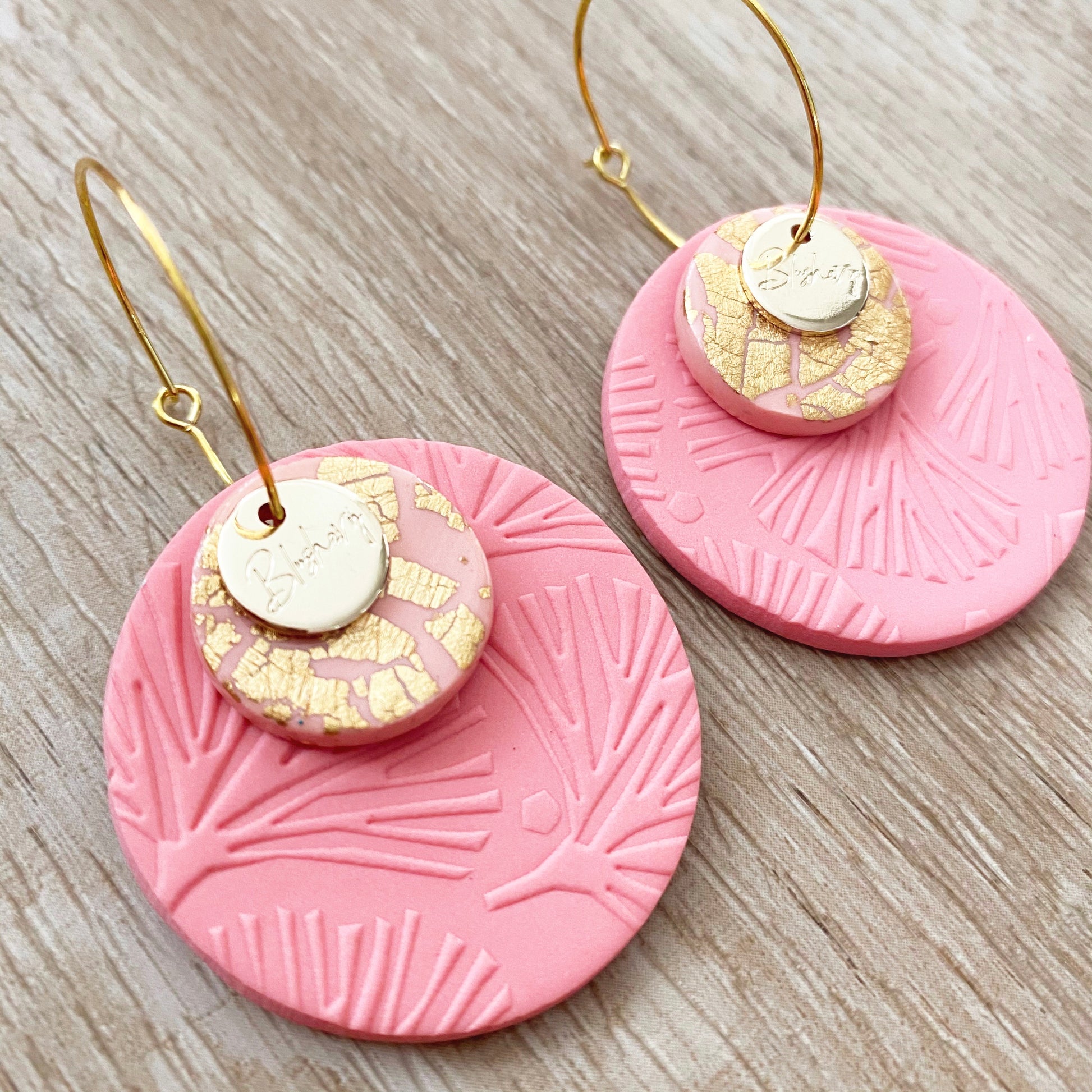 coral pink and gold, foliage leaf floral texture print, stacked discs on a hoop earring